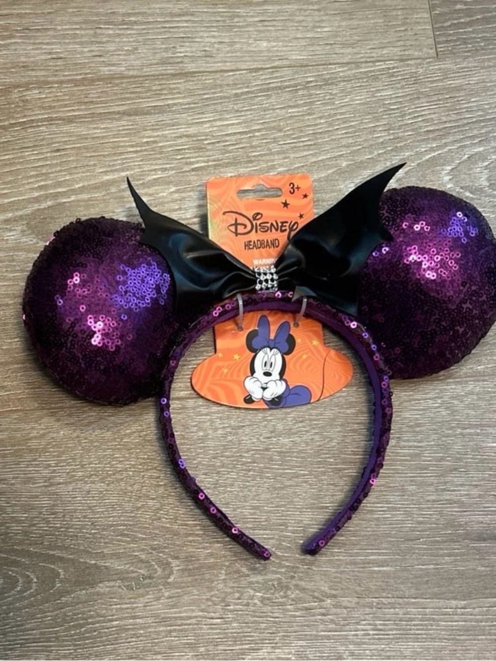 Disney Purple Sequin Minnie Ear Headband with Black Bow